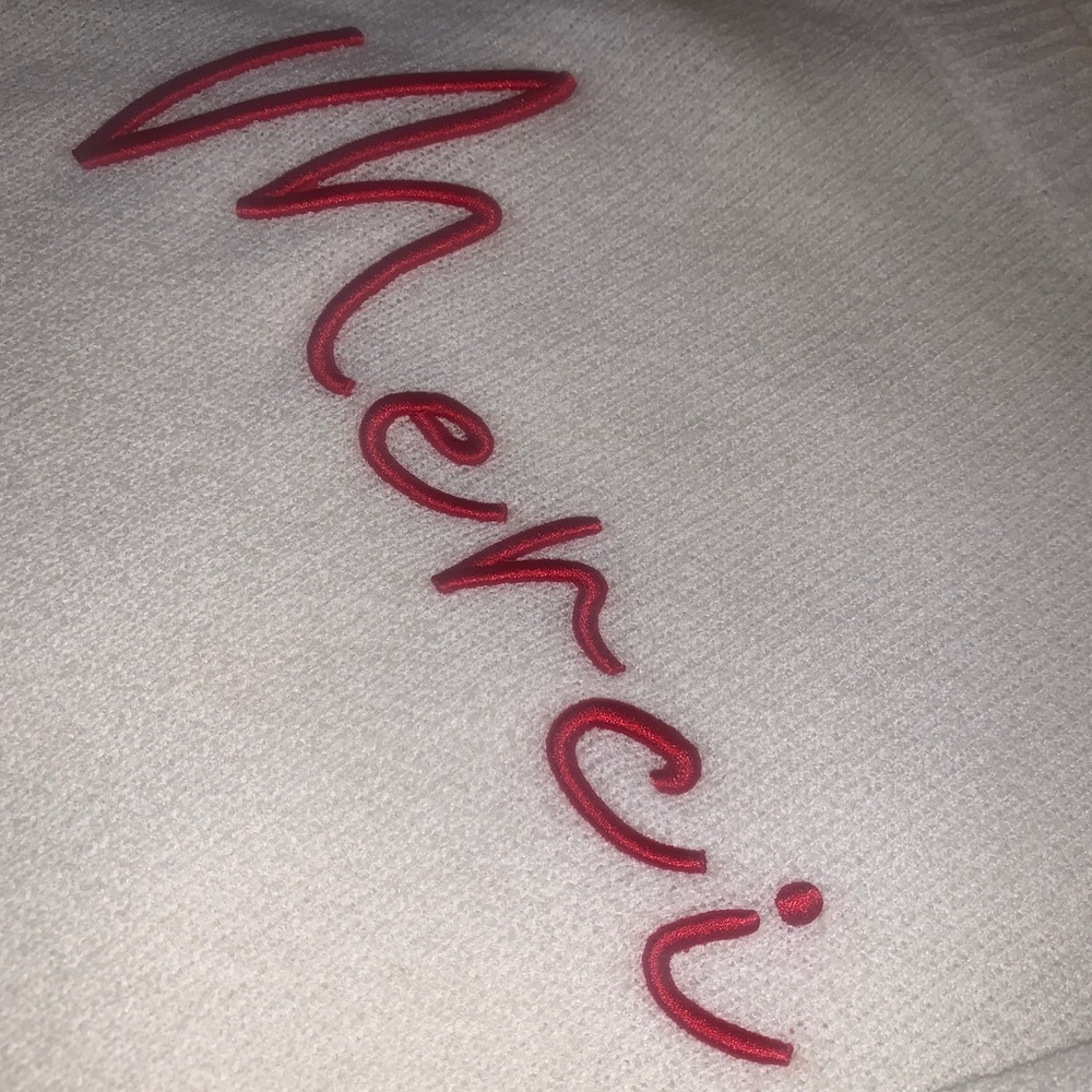 Embroidered white sweater